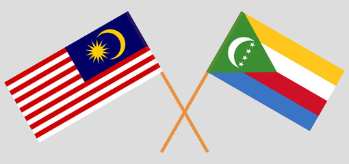 Crossed flags of Malaysia and the Comoros. Official colors. Correct proportion
