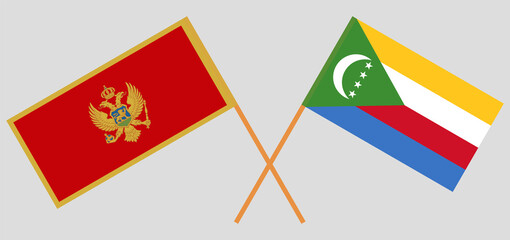 Crossed flags of Montenegro and the Comoros. Official colors. Correct proportion