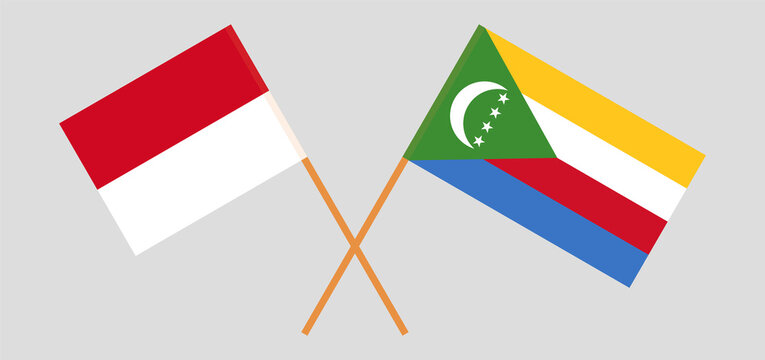 Crossed flags of Monaco and the Comoros. Official colors. Correct proportion