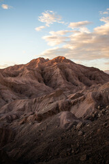 A red mountain, on a landscape similar to mars, at sunset, in desert of Atacama, Chile