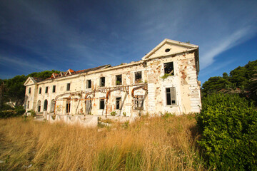 Fototapeta na wymiar Abandoned former hotel near Dubrovnik, left during Jugoslavian war 1991