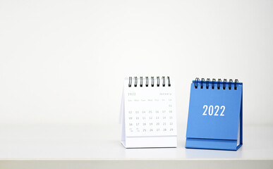Happy new year 2022. Close up calendar on business desk background,copy space