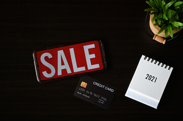 credit card and calendar 2022 sale concept on desk background