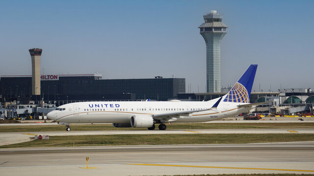 United Airlines Boeing 737 MAX 9 taxies on the runway after landing at Chicago O'Hare International Airport.