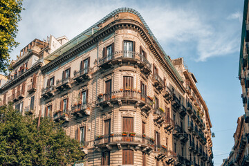 Facade of the beautiful historical building in Palermo, Sicily