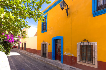 Colorful old city streets in historic city center of Zacatecas near central cathedral. It is a popular mexican tourism destination.