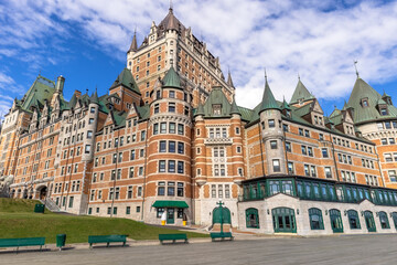 Fototapeta premium Famous Chateau Frontenac in Quebec historic center located on Dufferin Terrace promenade with scenic views and landscapes of Saint Lawrence River.