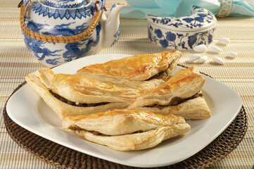 Puff pastry triangles filled 