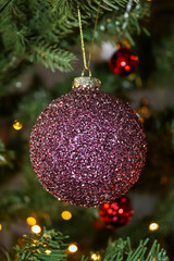 Close-up to glittering Christmas tree ball
