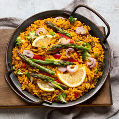 Vegan Paella on gray background.