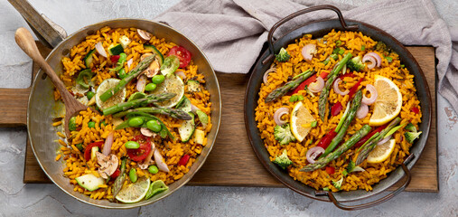 Vegan Paella on gray background.