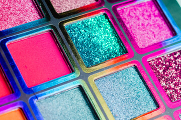 Flat lay of Broken bright multicolor eyeshadow as samples and swatches of cosmetic beauty product isolated on white background.