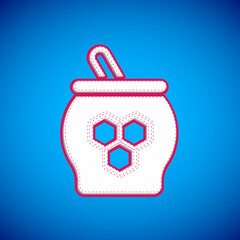 White Jar of honey and honey dipper stick icon isolated on blue background. Food bank. Sweet natural food symbol. Honey ladle. Vector