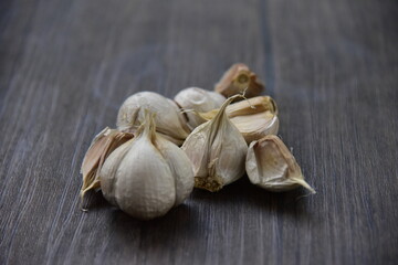 Allium sativum, Garlic is a species of bulbous flowering plant in the genus Allium and used as culinary receips.