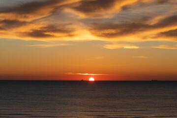 Naklejka na ściany i meble a beautiful sunrise at the seaside