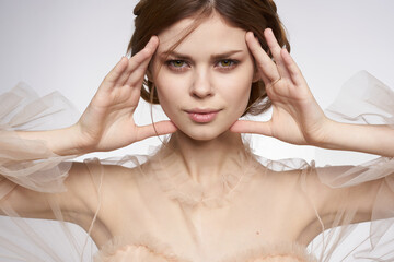 cheerful woman gesture hands cosmetics fashion hairstyle posing model studio