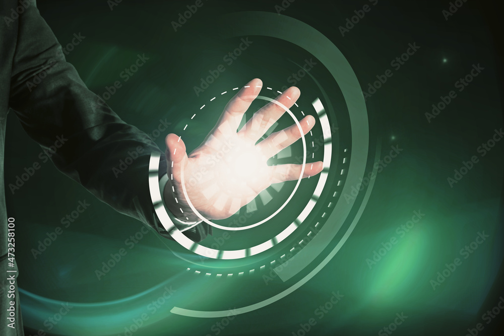 Poster Close up of man hand using abstract round interface on blue background. HUD, click, push screen and technology concept.