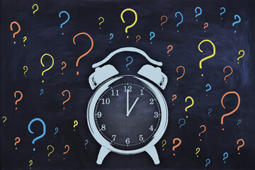 Abstract clock and question marks sketch on chalkboard wall background. Time management and deadline concept.