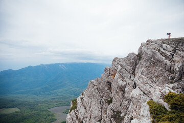 beautiful landscape on top of the mountain view of the forest and sky