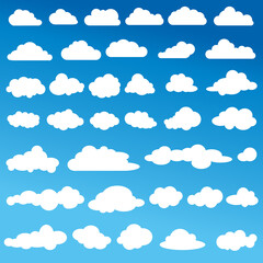 The set of white clouds on a blue gradient sky.   A set of white clouds on a blue gradient sky. simple vector graphics. Large set