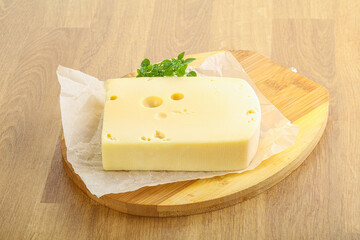 Maasdam cheese over the board