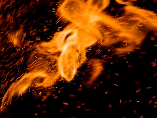 flame fire with sparks on black background