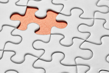Fototapeta premium Missing puzzle piece close-up
