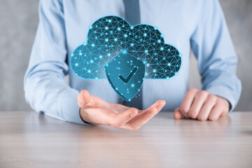 Cloud technology. Polygonal wireframe cloud storage sign with shield with a tick on dark blue....