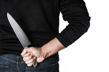 Person hairy skin chef holding kitchen knife hidden behind the back