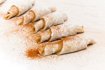 Making croissants, Christmas pastries with cinnamon