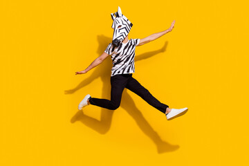 Full size photo of bizarre unusual guy zebra character jump up enjoy theme festival isolated over...
