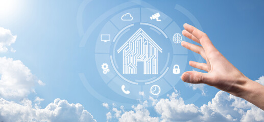 Businessman hold house icon.Smart home controlled, intelligent house, and home automation app...