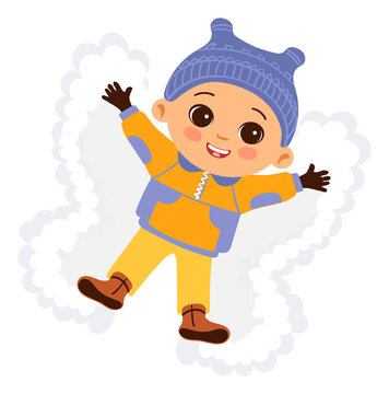 Kid making snow angel. Child lying on snowy ground spreading arms and legs