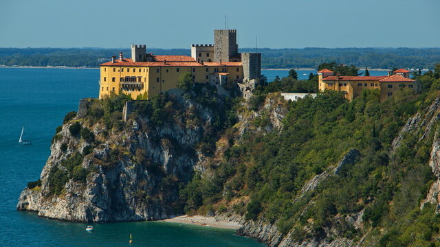 View of castle Duino from the hiking trail from Sistiana, Italy, Europe
