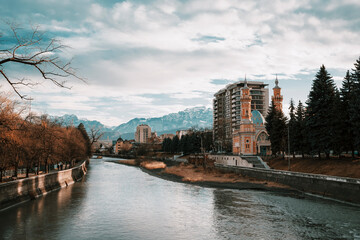 Vladikavkaz,  Russia.  Beautiful view of Caucasian mountains and mosque at autumn season 