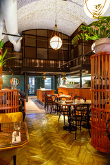 Interior of modern loft style restaurant. Bar counter
