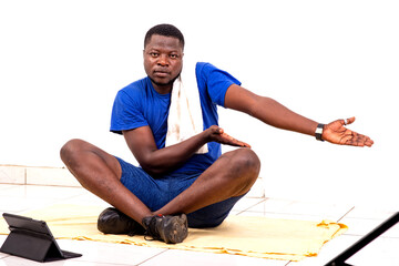 Fototapeta premium young sporty man doing stretching exercises with arms.