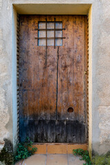 Rustic wooden door in an old country house