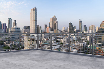Panoramic Bangkok skyline view, concrete observatory deck on rooftop, daytime. Luxury Asian...