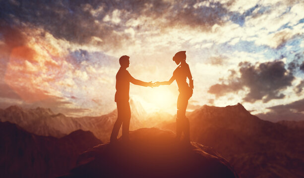 Alien and man meet and handshake on planet.