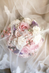 bouquet of light pink and white roses, decorated with pink hypericum
