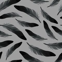 Vector seamless pattern with black raven feathers
