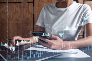 Fototapeta premium Woman hands typing the keyboard to research stock market to proceed right investment solutions. Internet trading and wealth management concept. Casual wear. Hologram Forex chart over close up shot