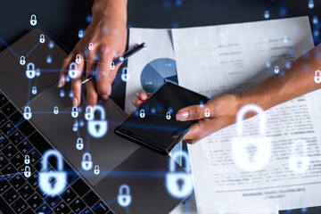 A woman programmer is typing a code on computer to protect a cyber security from hacker attacks and...