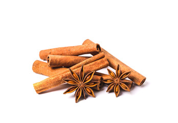 Cinnamon sticks and star anise spice isolated on white background closeup.