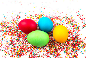 colorful easter eggs on the background of colored beads