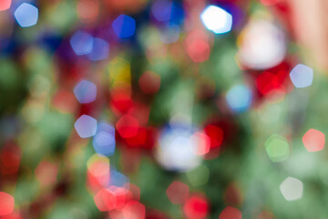 Background of blurred Christmas lights on Christmas tree