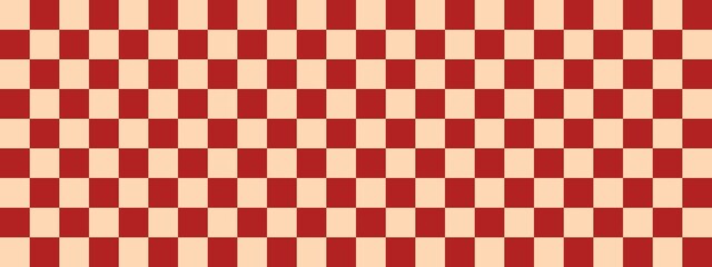 Checkerboard banner. Firebrick and Apricot colors of checkerboard. Small squares, small cells. Chessboard, checkerboard texture. Squares pattern. Background.
