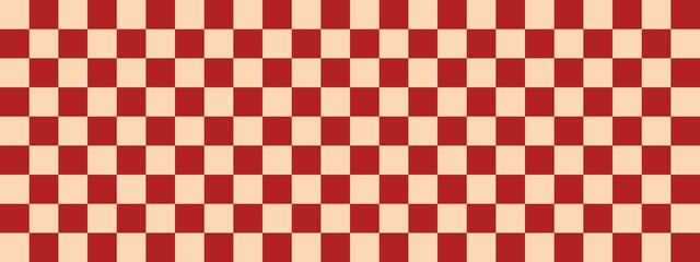 Checkerboard banner. Firebrick and Apricot colors of checkerboard. Small squares, small cells. Chessboard, checkerboard texture. Squares pattern. Background.
