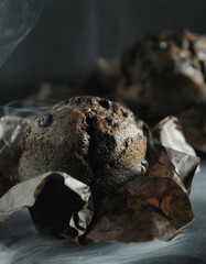 chocolate muffin with chocolate on a dark background